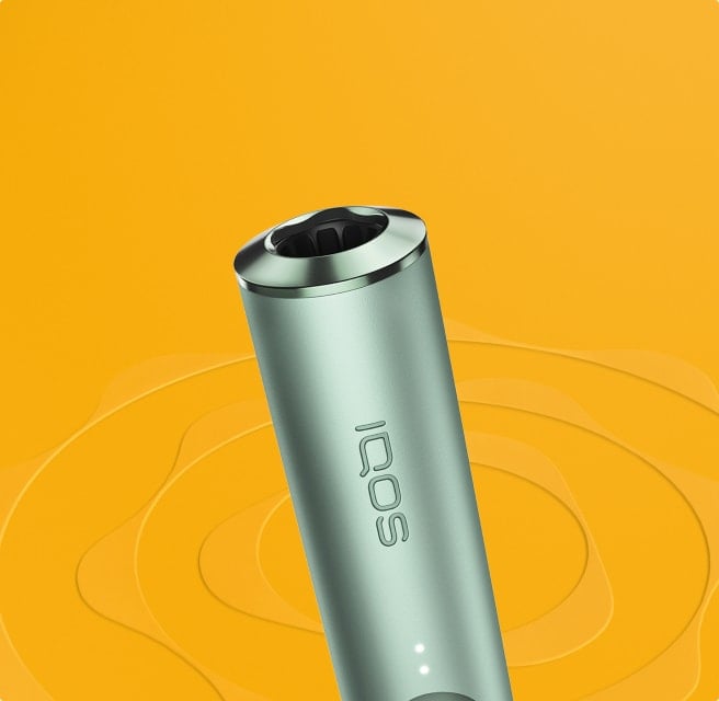 A Jade Green IQOS ILUMA Holder.