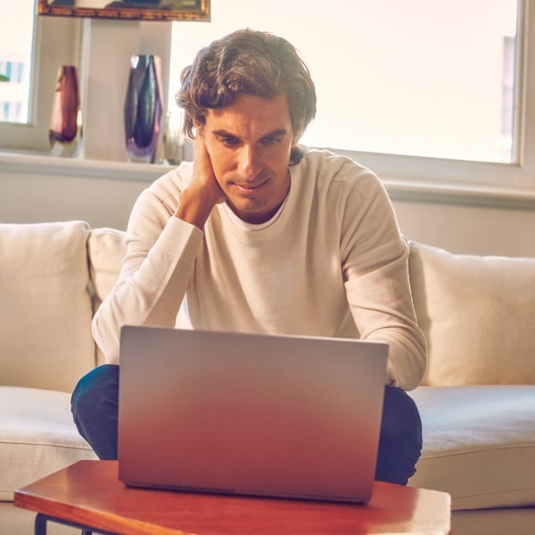 A person using a laptop.