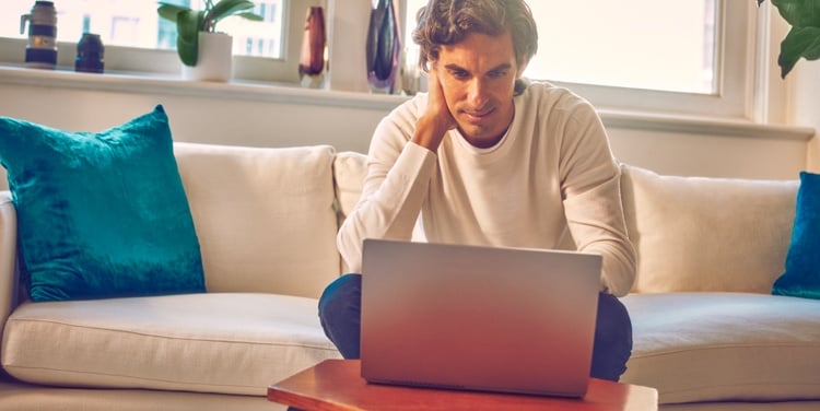 A person using a laptop.