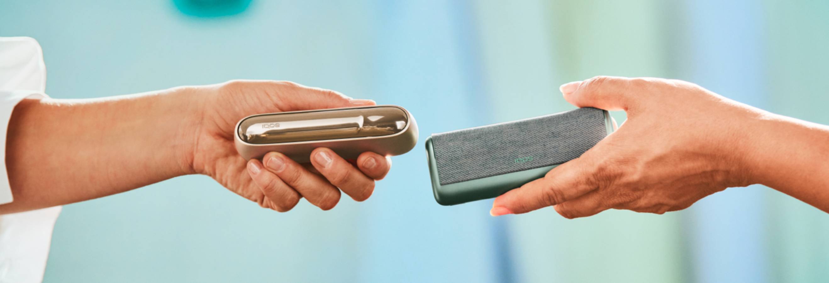 An IQOS 3 DUO and an IQOS ILUMA PRIME being compared.