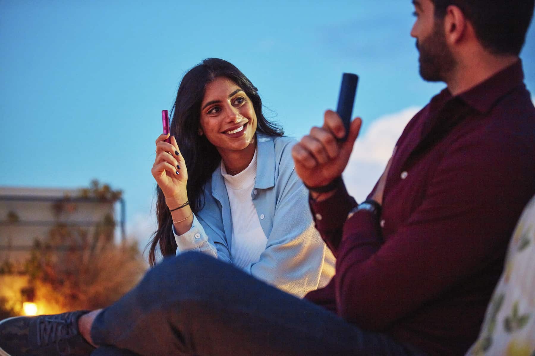 Usuarios de IQOS sonriendo
