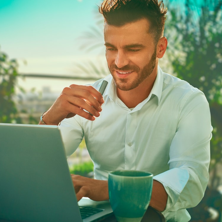 A man using an IQOS device.